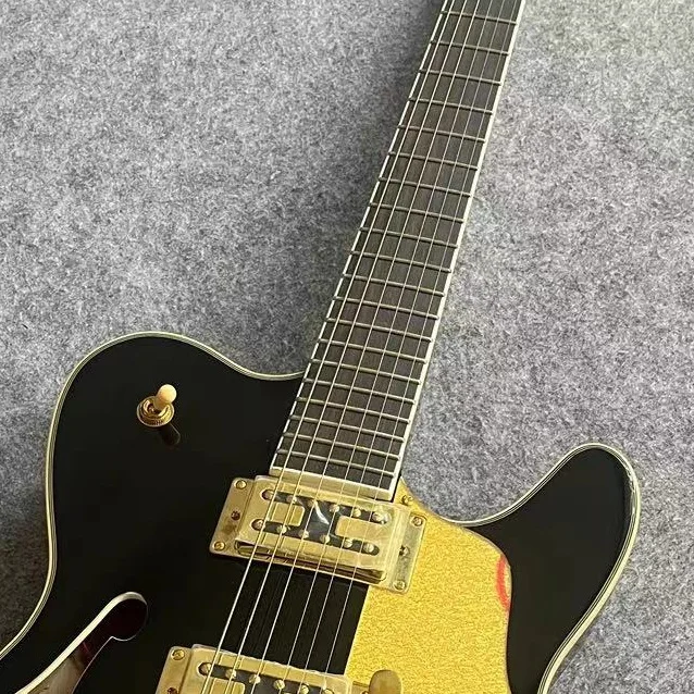 Электрическая гитара из клена и цветущего персика