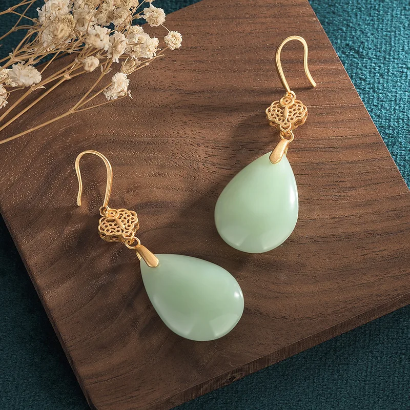 Новые серьги в китайском стиле медные позолоченные полые дизайнерские форме