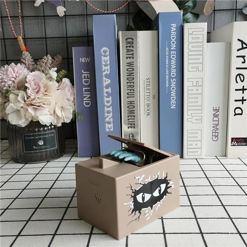 

Пластиковая копилка-банкомат Ghost Hand