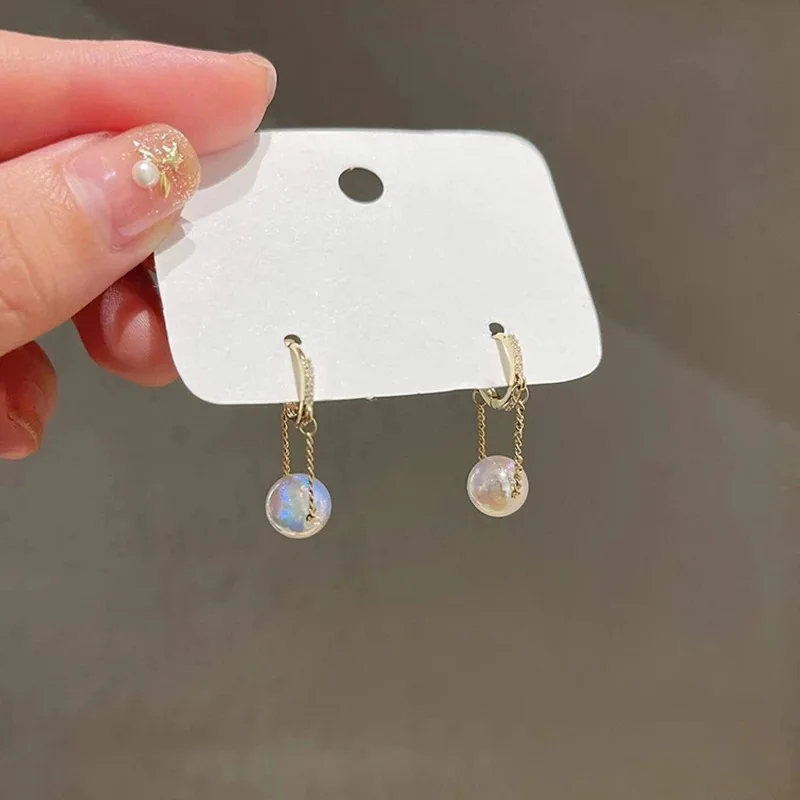 

Korean Fashion Mermaid Kyi Zircon Chain Pearl Earrings Personality Contracted Ear Clip Fashionable Joker Earrings of Women