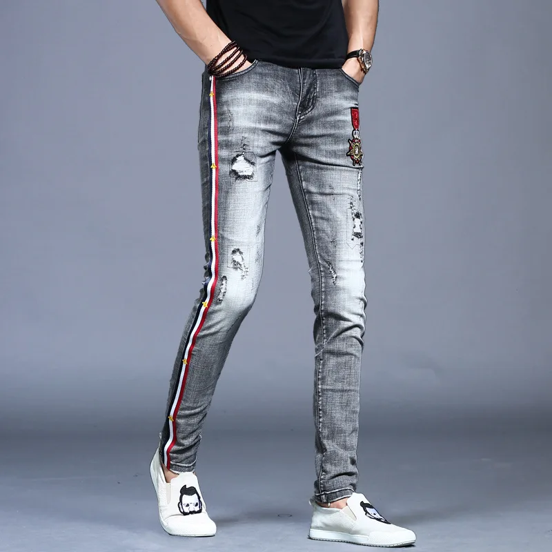 

Оптовая продажа 2021, модные мужские джинсы с вышивкой в виде дыр, мужские брендовые летние тонкие облегающие корейские трендовые повседневн...