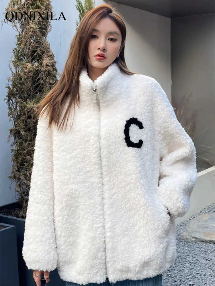 

2022 Korean Version of Fashionable Young and Trendy Loose Leather Women's Fur Coat Medium Long Sheep Sheared Grain Real Fur Coat