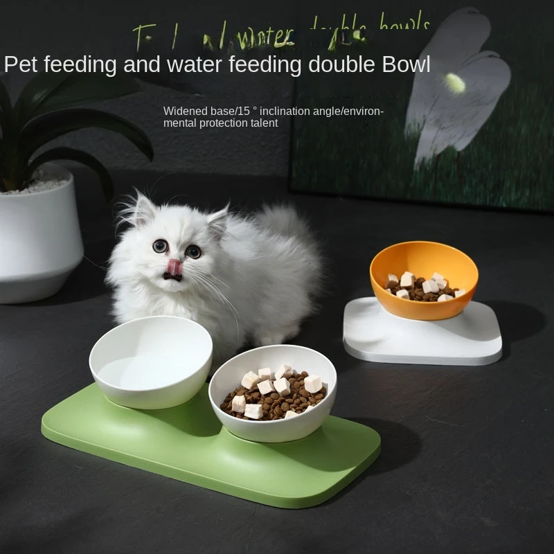 

Новая двойная миска для питомцев с защитой угла наклона шейного отдела позвоночника собаки кошки с диагональной подачей воды обеденный сто...