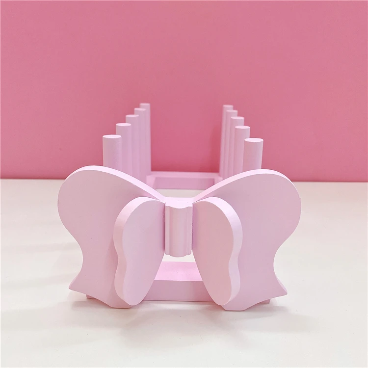 

Деревянный держатель для посуды сердце-бант