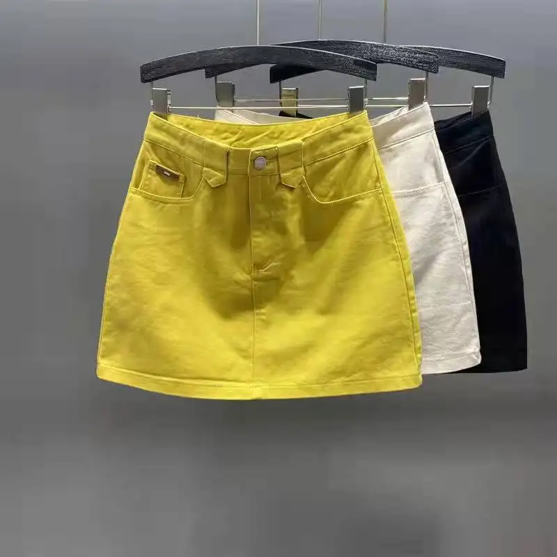 2022 spring and summer new yellow denim skirt women's high-waisted thin a-line bag hip anti-lighting skirt  A-LINE