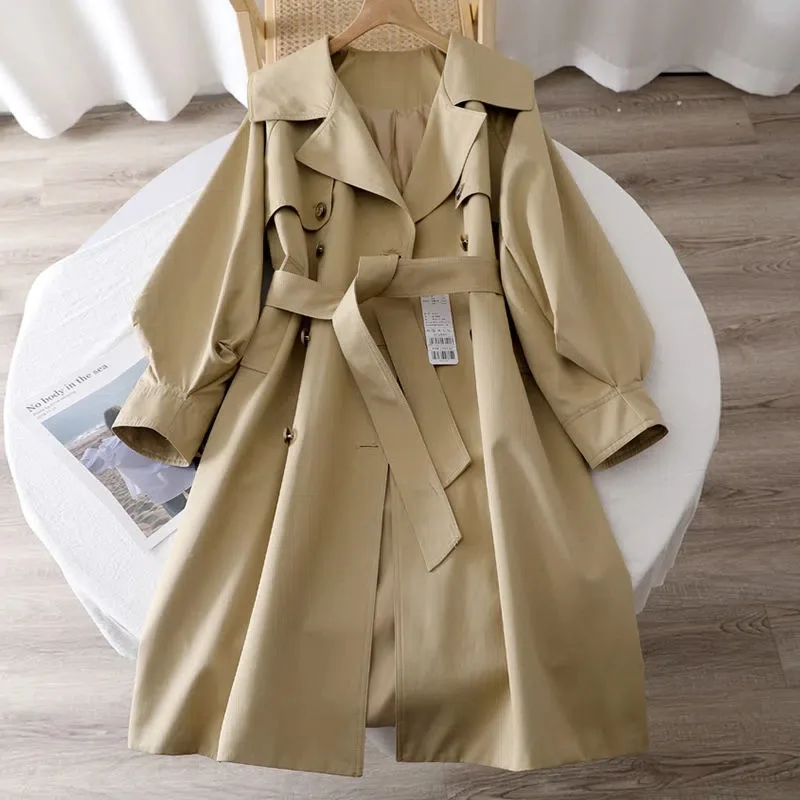 

British Style Long Windbreaker Coat 2023 Autumn New Korean Fashion Tie Waist Lapel Double-Breasted Coat.