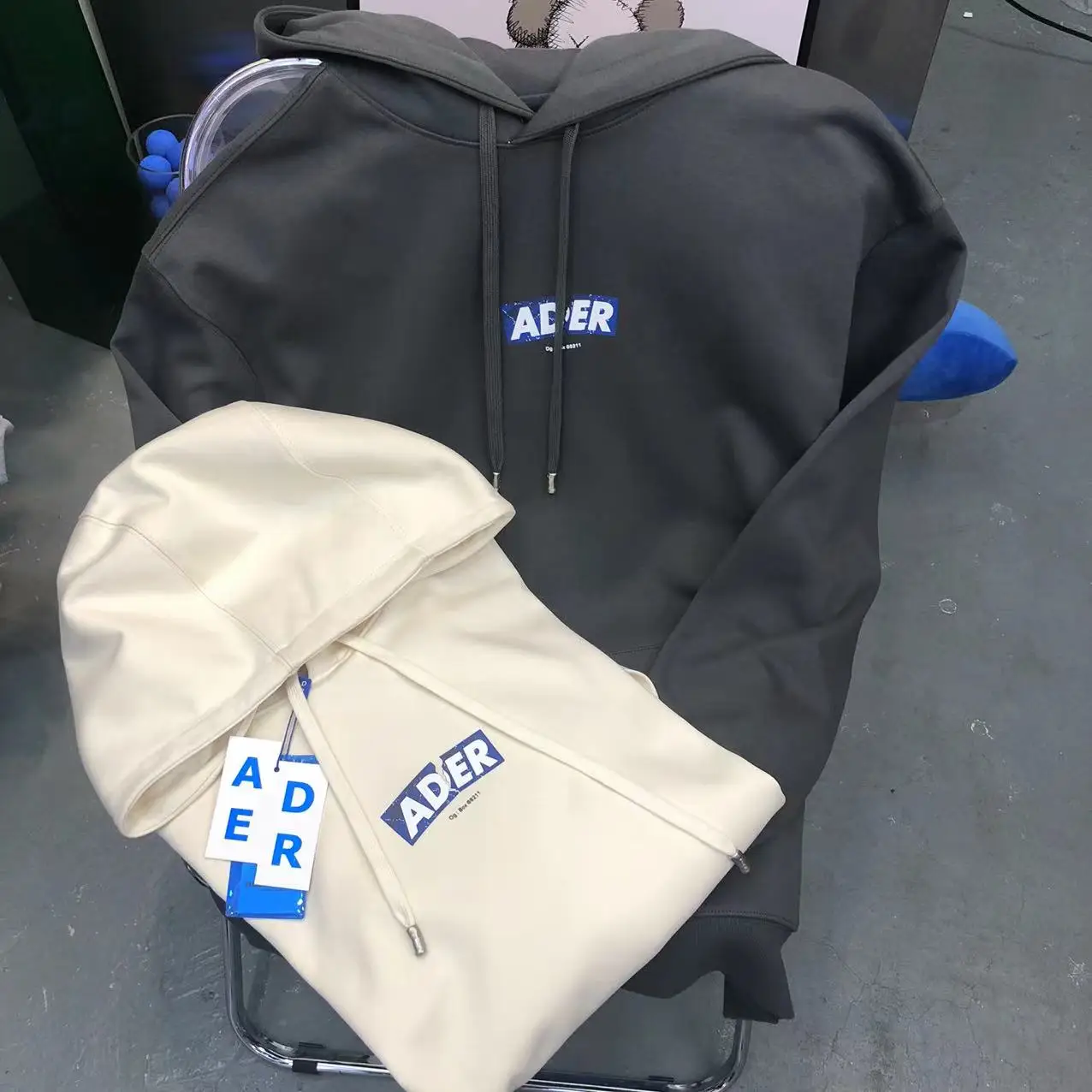 

The new ADER long-sleeved men's and women's loose printed hooded sweater