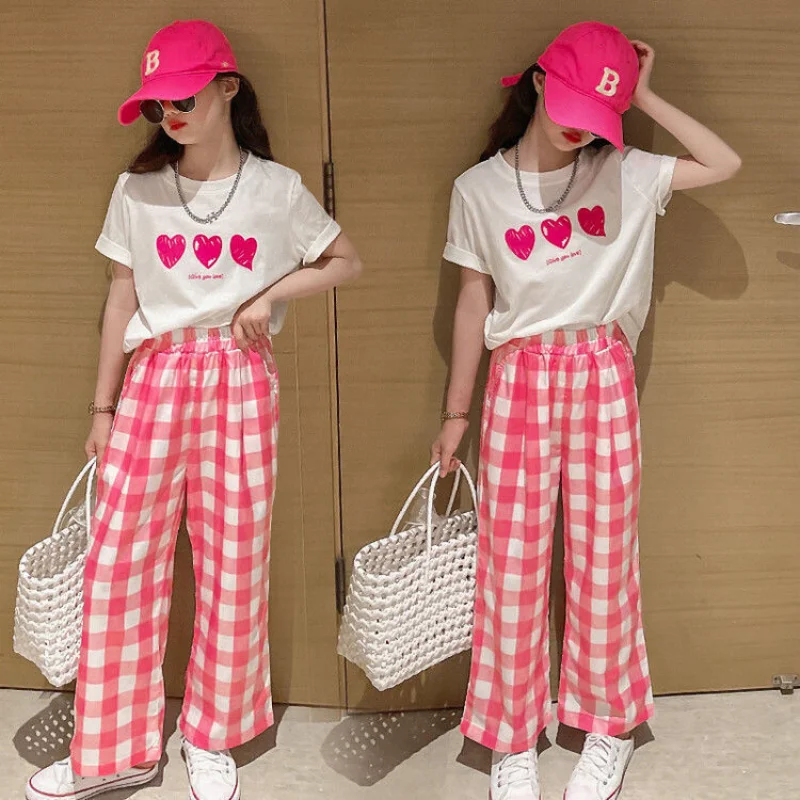 

2023 Korean Style Girls' Summer Short-sleeved Set Trendy Long Pants and Fashionable Top for Children's Sportswear Two-piece Set