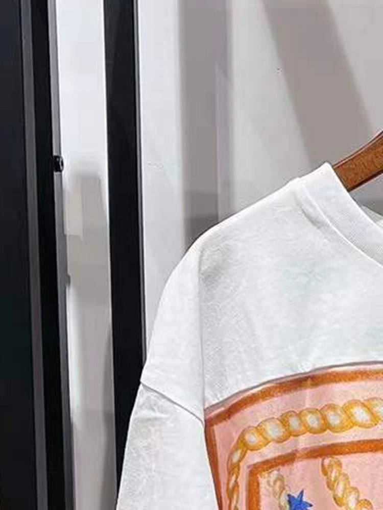 

Женская футболка с принтом, круглым вырезом и полурукавом