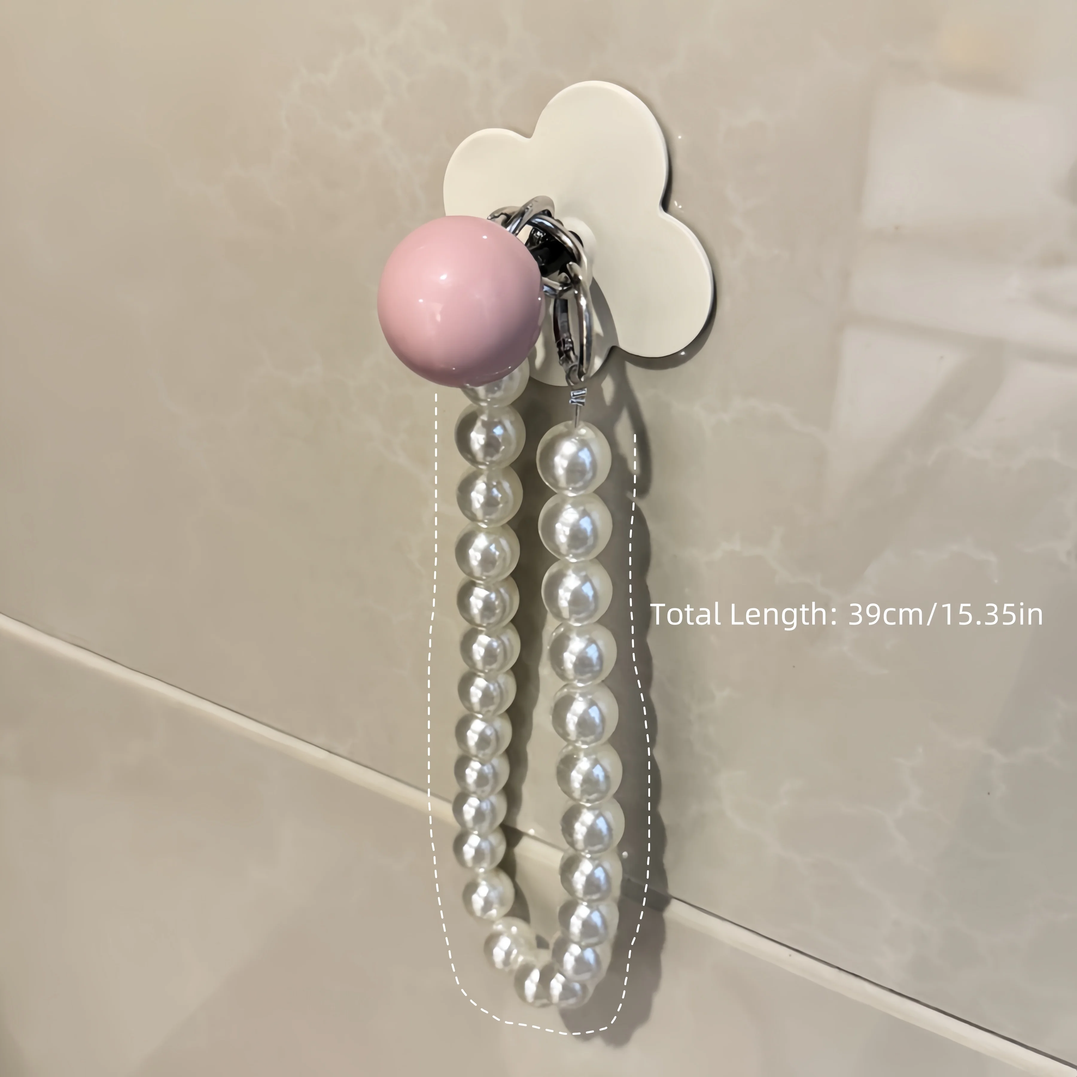 

Пластиковый розовый держатель для бумажных полотенец