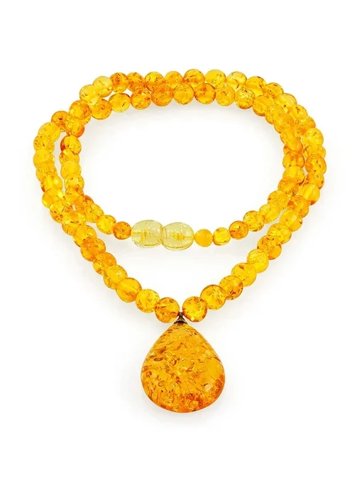 Нежное колье Лаура из лимонного янтаря с небольшой искрящейся подвеской |