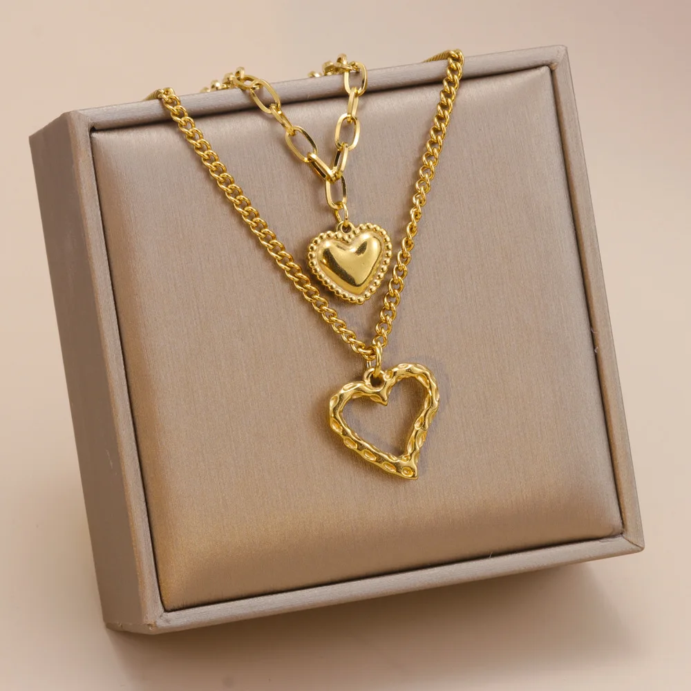

Euro-american fashion double layer titanium steel love pendant necklace collarbone chain female hollowed peach heart necklace