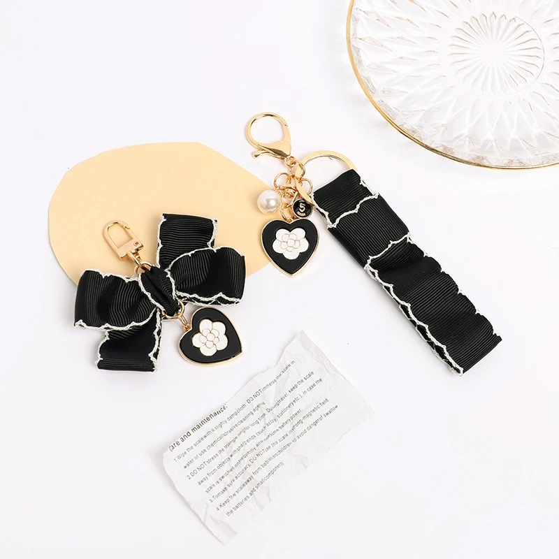 

Webbing Love Small Fresh Fabric Pearl Chain Bag Decorated With Alloy Keychain Pendant