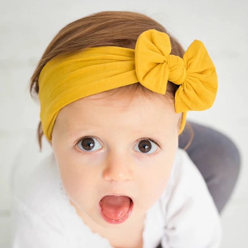

Cute Bowknot Baby Headband Turban Lovely Nylon Elastic Wide Headbands Solid Color Newborn Infant Hair Bands Kid Hair Accessories