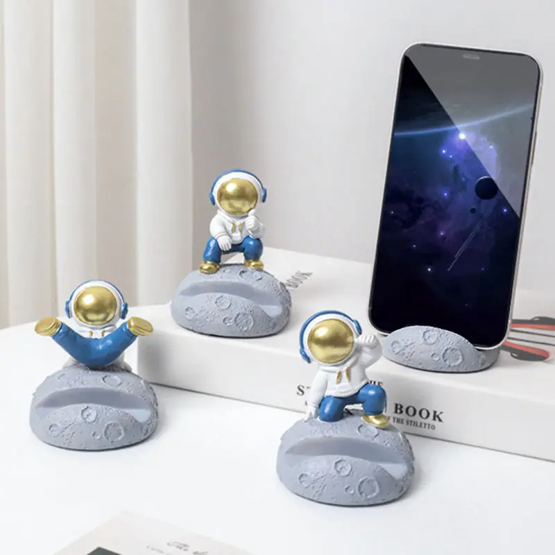 

Противоскользящая дизайнерская подставка для телефона в виде симпатичного астронавта, полимерная скульптура, искусственная подставка для комнаты, креативный домашний аксессуар