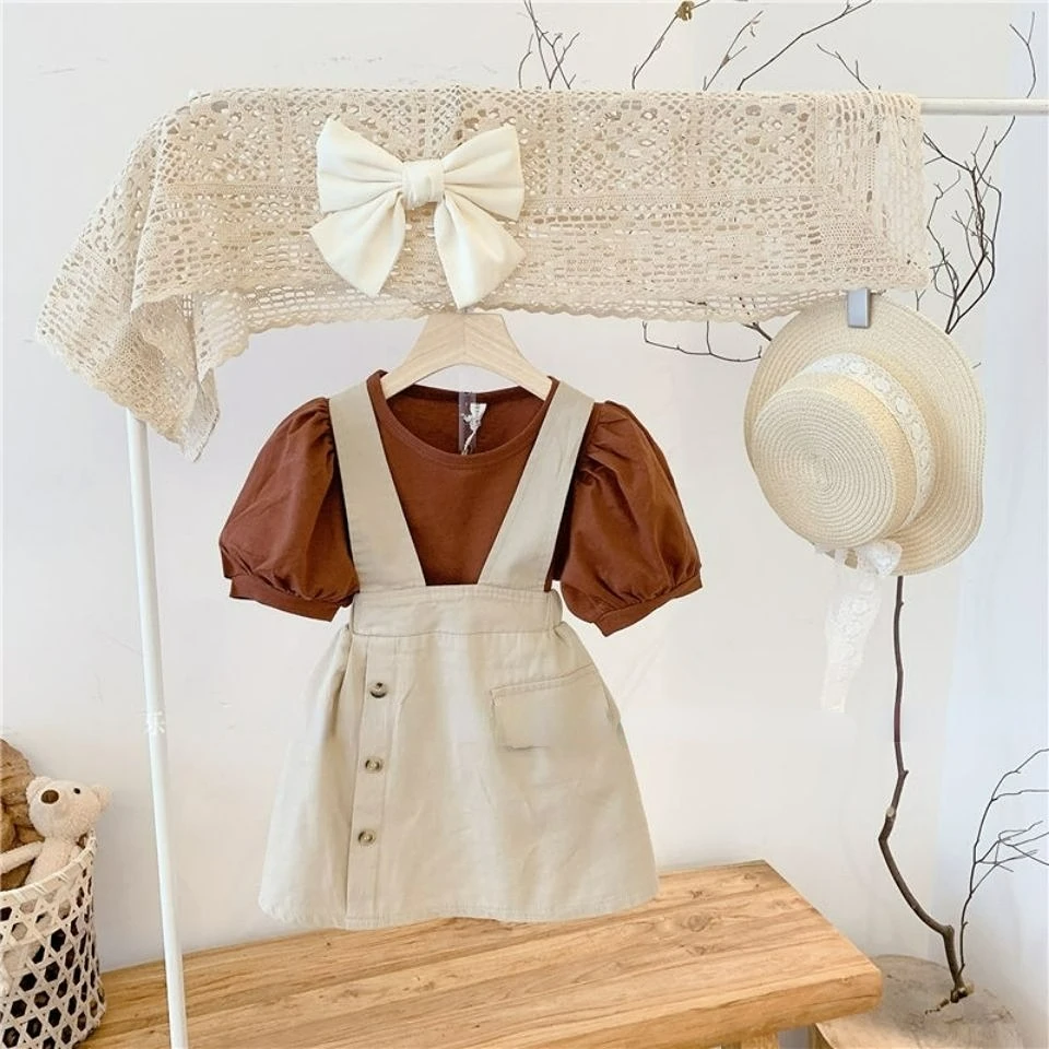 

Комплекты одежды для маленьких девочек, Новинка лета 2023, футболка с пышными рукавами для маленьких девочек + юбка на бретельках, костюм из двух предметов, корейская детская одежда