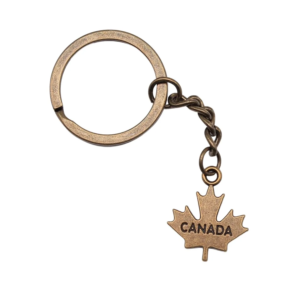 Сувениры подарок мужской брелок 2 цвета 22x18 мм с подвеской в виде канадского