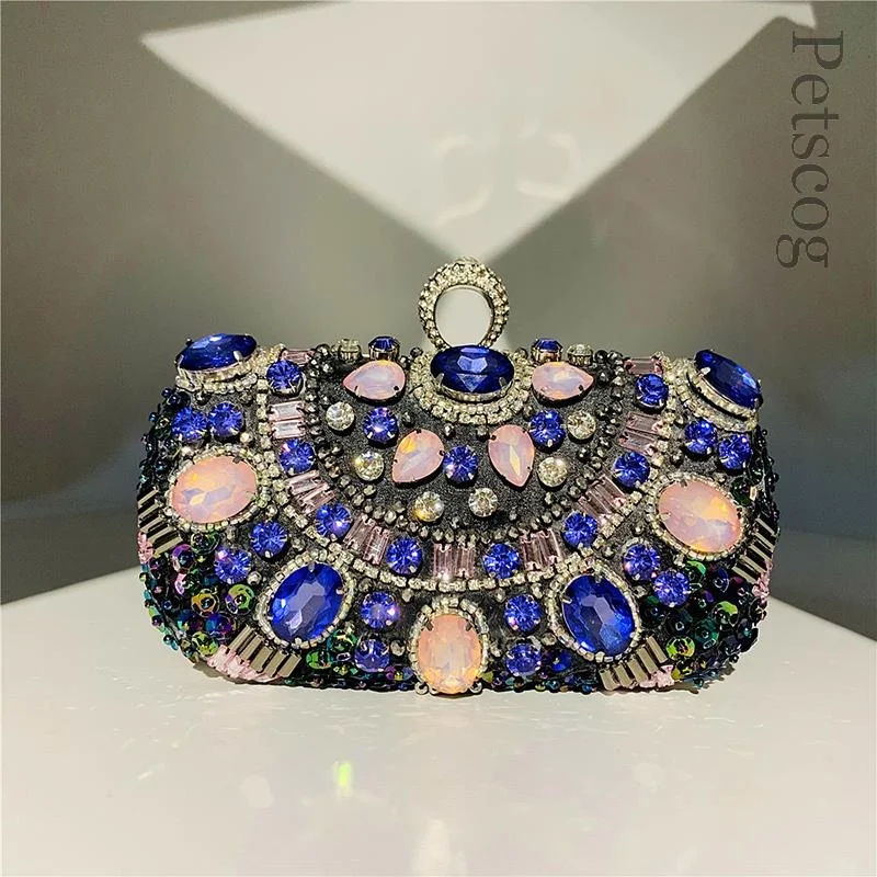 

Женская вечерняя сумка-клатч с металлической цепочкой