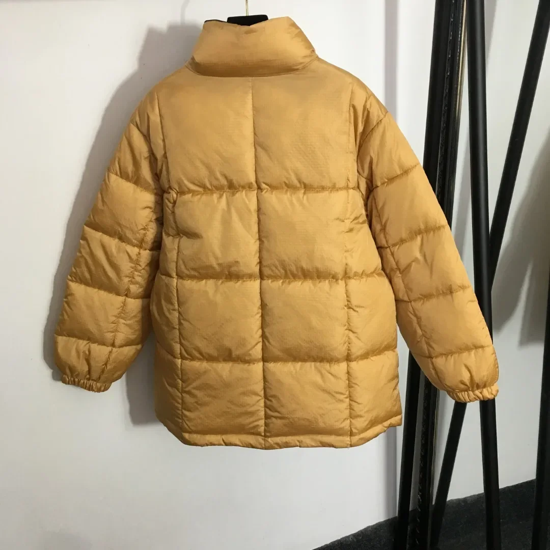 Пуховик с пряжкой-бабочкой