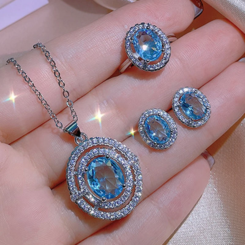 

Uilz 2022 Fashion Jewelry Sets for Womens Sea Blue Color Cubic Zirconia Ellipse Stud Earrings Necklace Bracelet and Ring Sets
