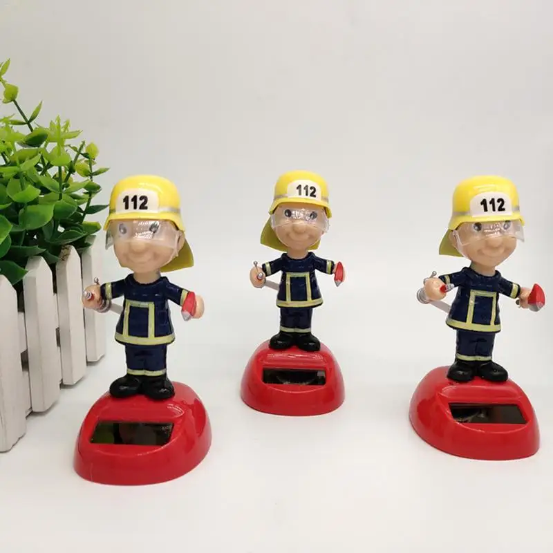 

Car Solar Firefighter Shaking Head Doll Decoration Environmentally Friendly Materials long service life Dashboard Accessories
