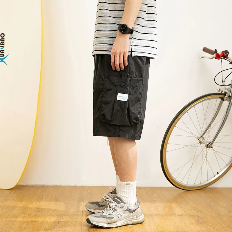 Городская мода 2024 новые летние мужские спортивные повседневные тонкие шорты в