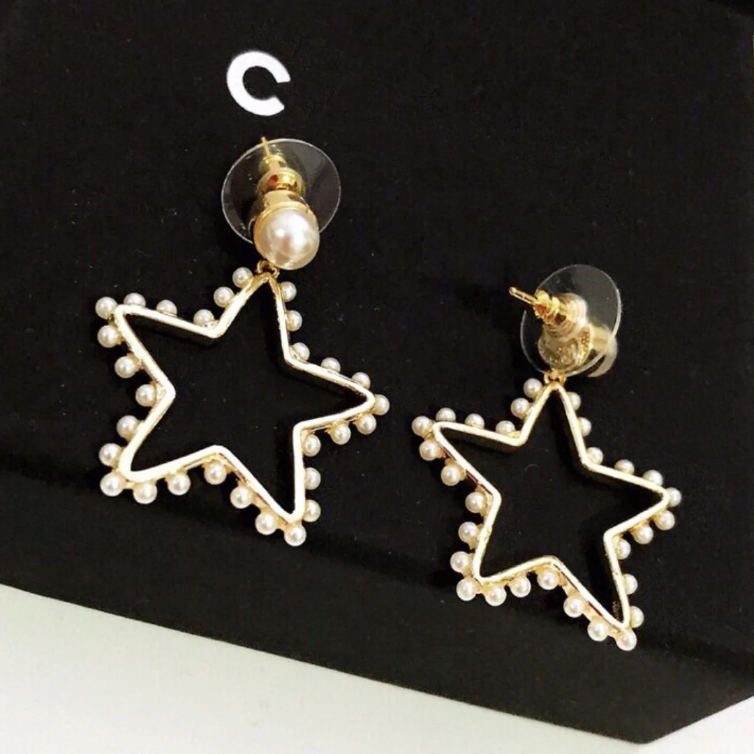 

S925 silver needle. Pentagram inlaid pearl earrings simple fashion retro ladies jewelry high quality luxury ladies earrings