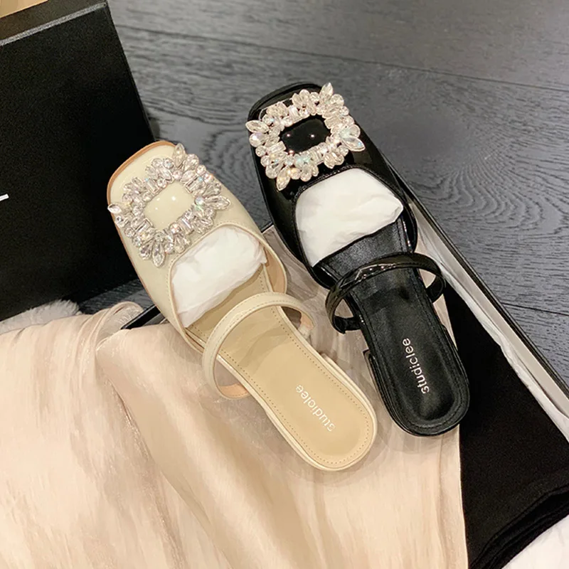 

2022 Summer new rhinestone shallow mouth Baotou thick heel semi-slip sandals women wear back empty sandals women