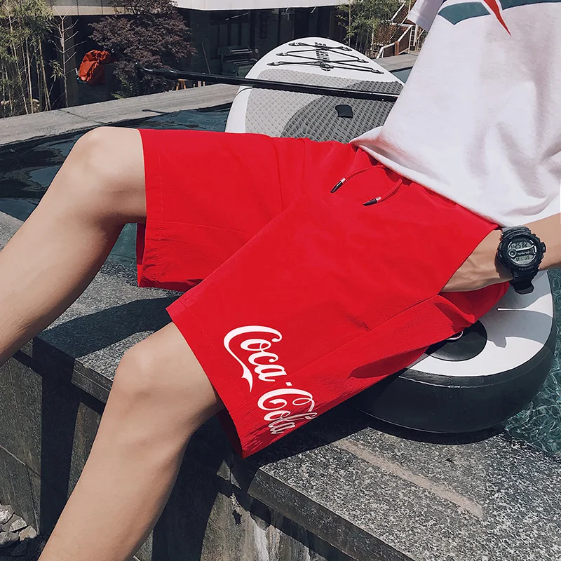 

Coca-Cola Sports five-point pants tide brand men's and women's fitness basketball running shorts red loose casual pants