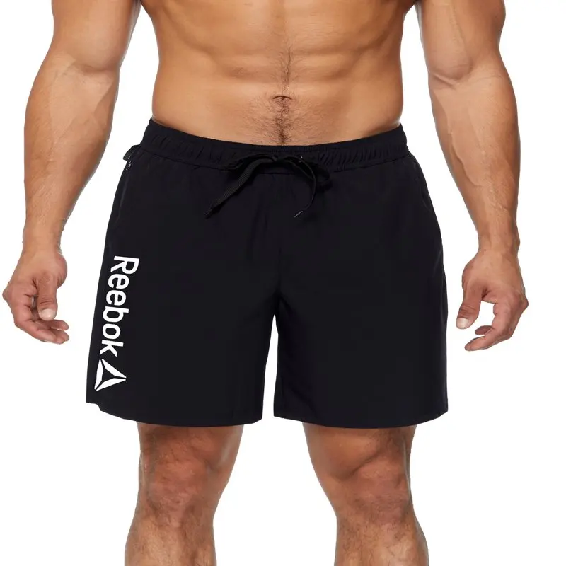 

Men's Solid 7" Swim Trunk with UPF 50+, Sizes S-XXL