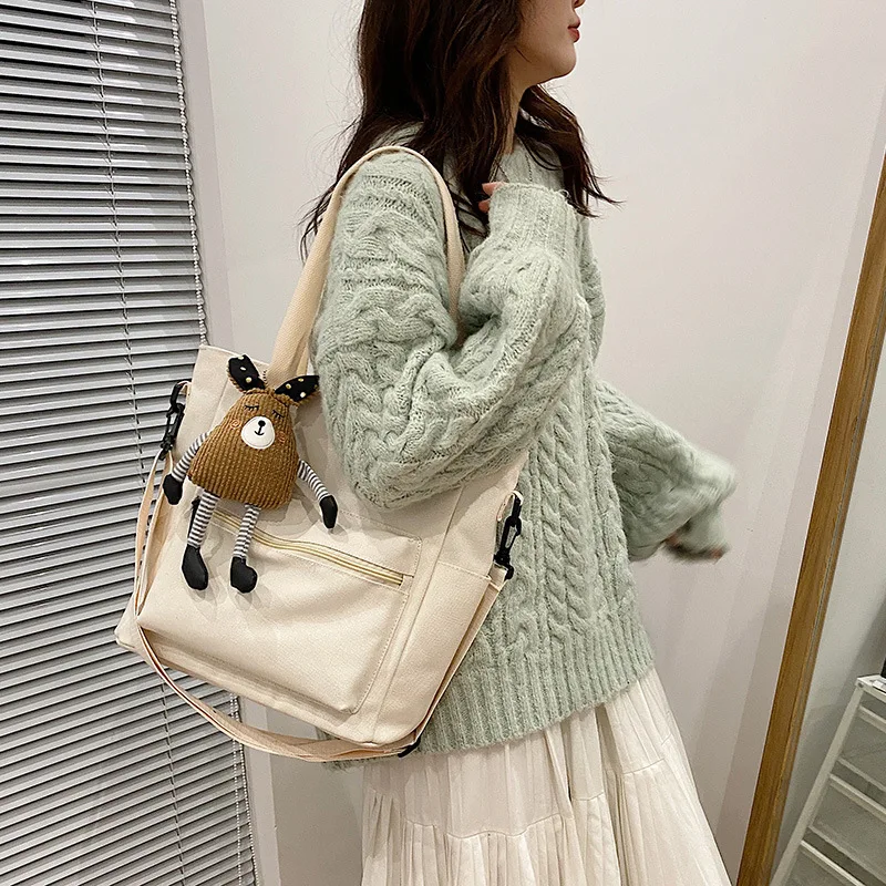 

Korean version ins messenger bag women's large capacity simple leisure travel bag shopping bag college style student bag canvas