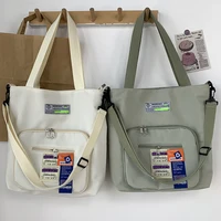 new women and man messenger canvas bag womens one shoulder high capacity student nylon canvas bag commuter bag tote bag handbag