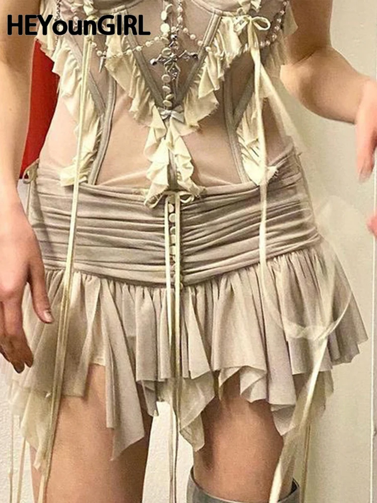 

Модная плиссированная мини-юбка HEYounGIRL в стиле 1920-х, юбка с рюшами и низкой талией, ассиметричные короткие юбки, в стиле Харадзюку
