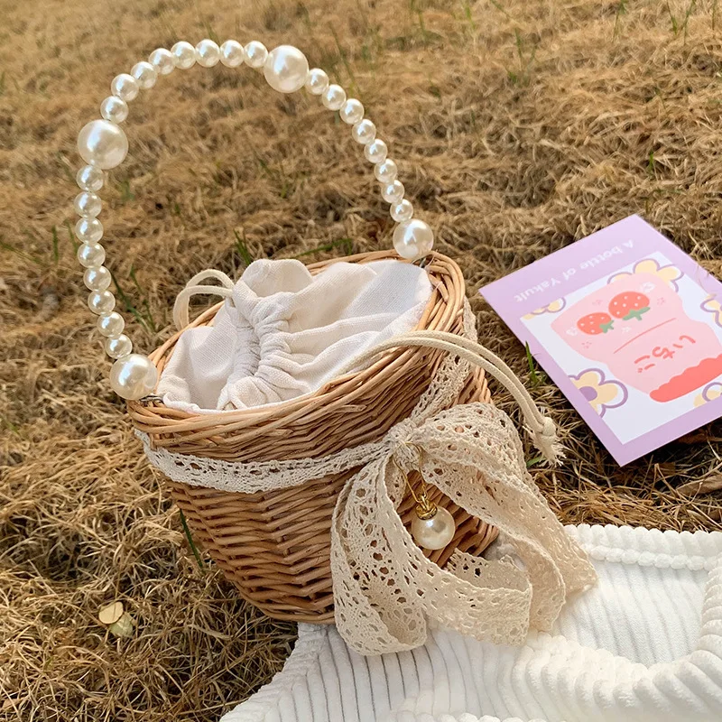 

Popular Casual Handbag Women's Bag 2022 Spring New Fashion Straw Woven Portable Bucket Bag Simple Pearl Messenger Bag