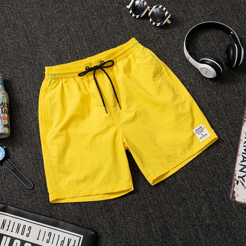 

Casual Shorts Men Running Sport Baseball Shorts Male Summer Elastic Waist Loose Solid Knee Length Pant Fashion New Clothing A15
