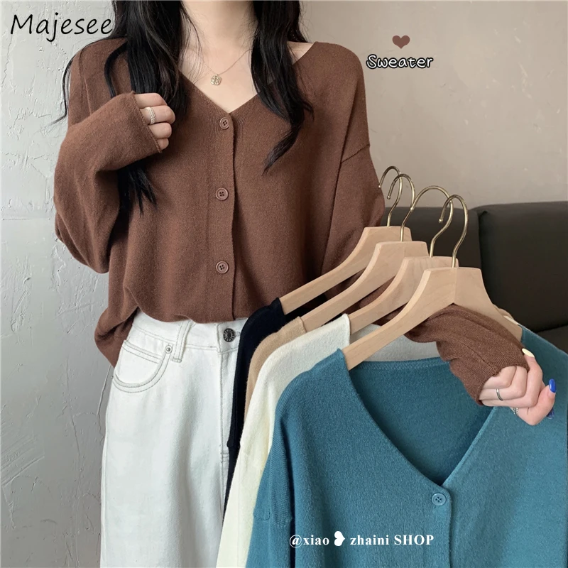 

Однотонный женский свободный кардиган с V-образным вырезом, мягкий винтажный элегантный нежный весенний вязаный джемпер в стиле ретро для колледжа, повседневный однобортный Кардиган