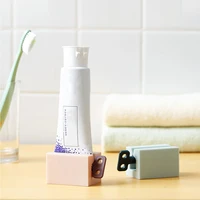 1pc toothpaste dispenser squeezer bathroom accessories home toothpaste holder organizer hair dye cosmetic creative squeezer new