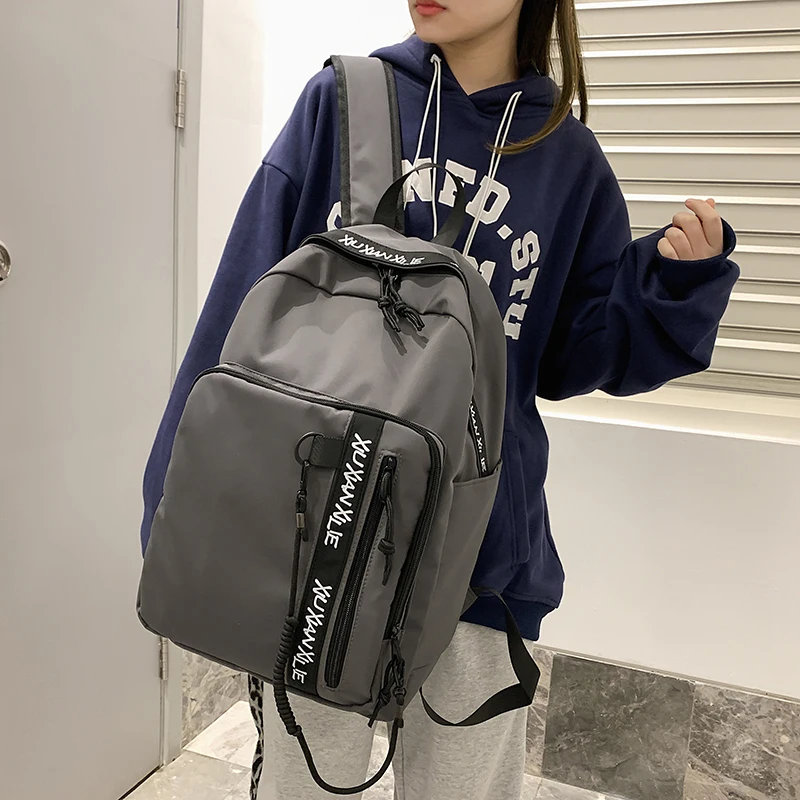 

Новинка 2022, водонепроницаемый нейлоновый женский рюкзак, Корейская и японская мода, Женский школьный ранец, многослойная дорожная сумка с п...