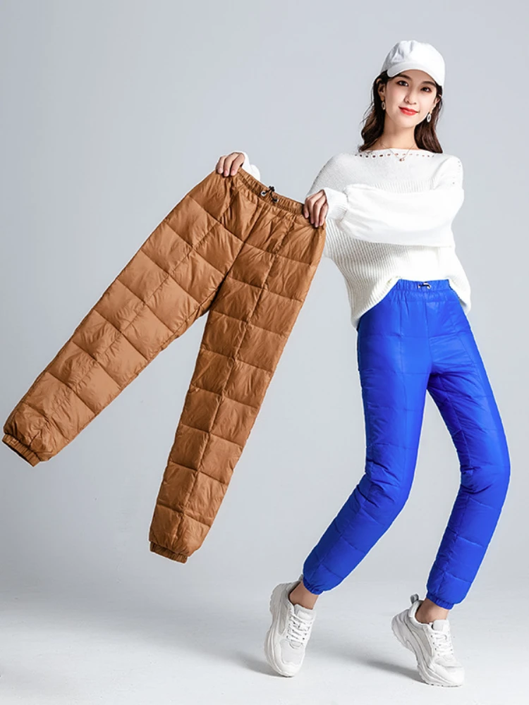 

Женские зимние брюки-карандаш на белом утином пуху, с эластичным поясом