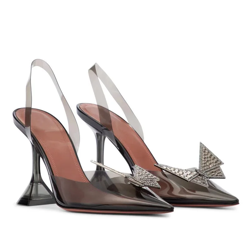 

New Early Spring Pointed Transparent Sandals Female Baotou Rhinestone Bow Glass with High Heels on Behalf of The Hair.
