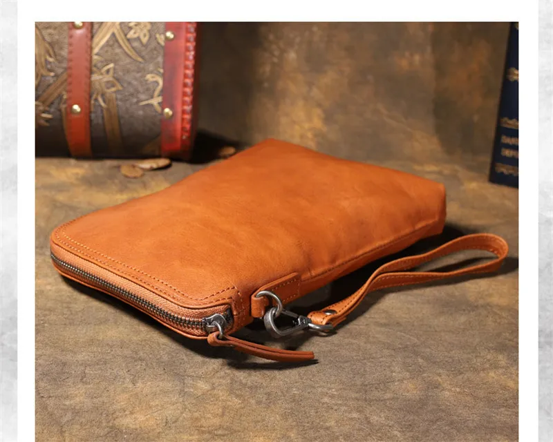 Fashion designer high-quality natural real leather men and women business clutches summer light hot sale mini messenger bag