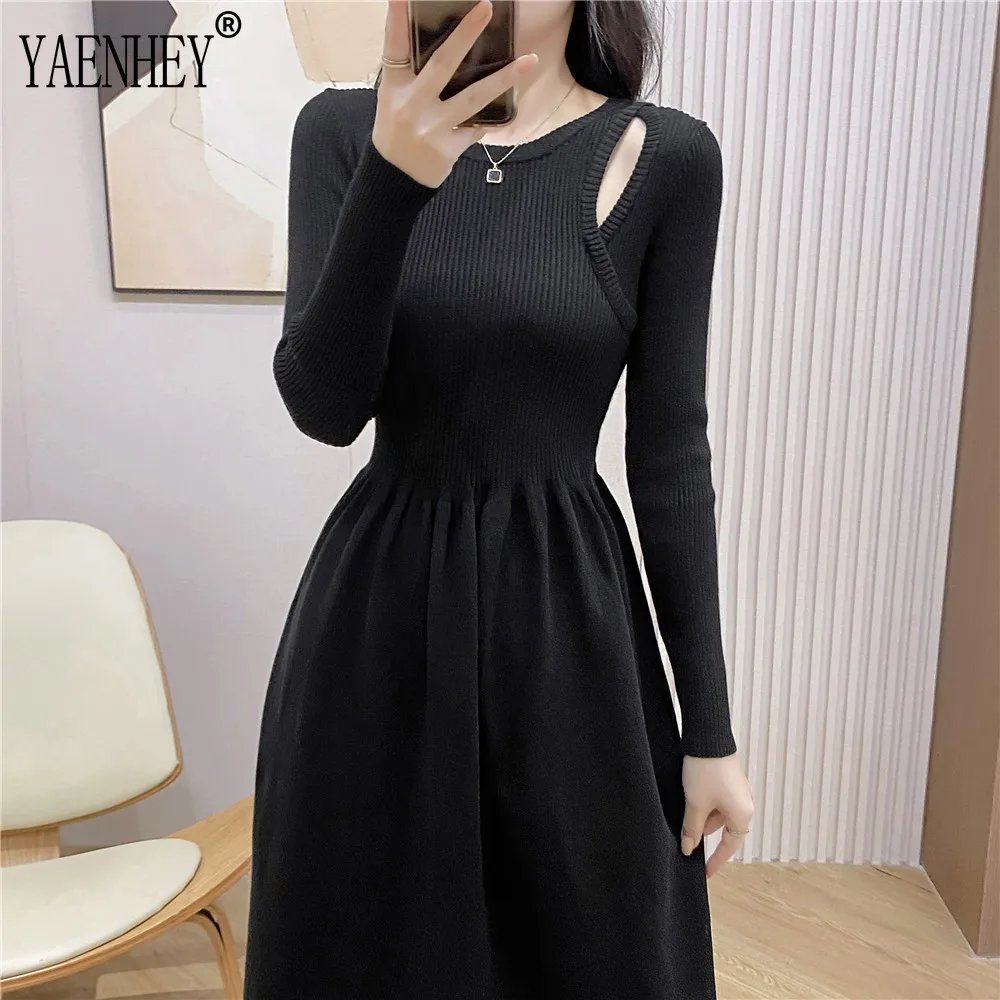 

Женское трикотажное платье-свитер средней длины, с круглым вырезом