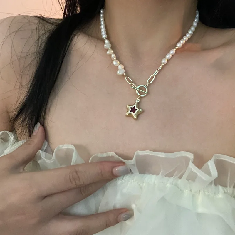 

Цепочка жемчужное из меди и золота 2022 пробы, с подвеской в виде звезды