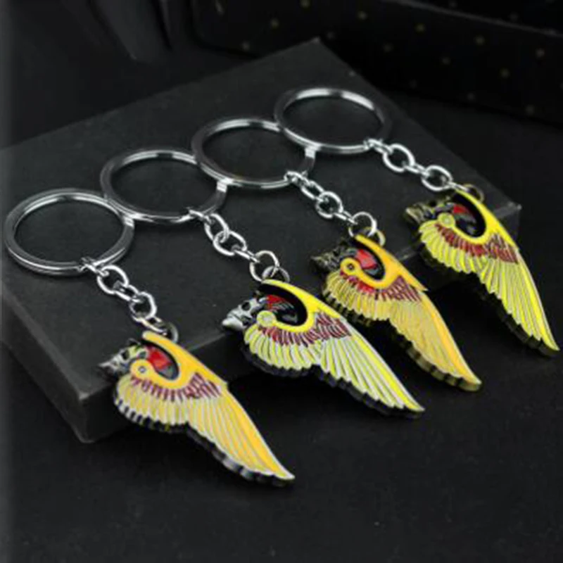 

Outlaws Hot sales New Arrival Skeleton Wing Motorcycle Biker Clothing Hells Angels Pins Man Party Rock Key chain Gift