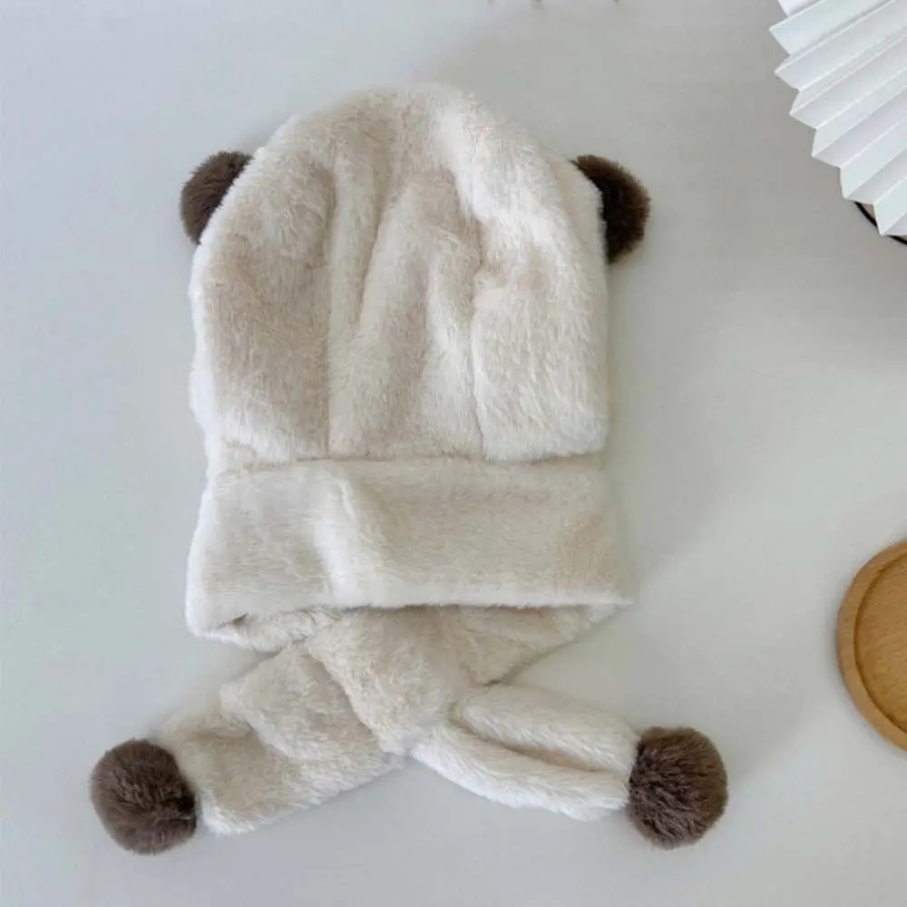 Рисунок 2 - Однотонная плюшевая шапка с медведем