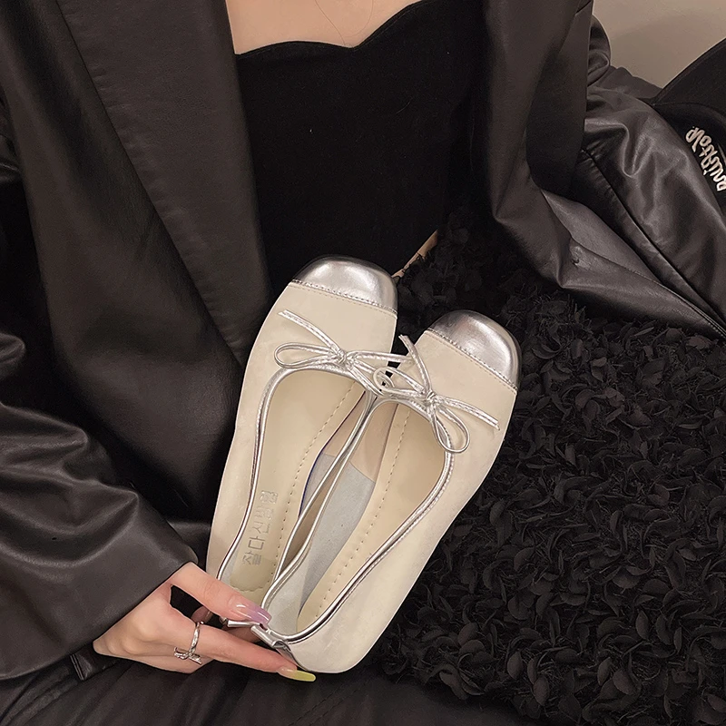 Женские туфли на плоской подошве с бантом-бабочкой