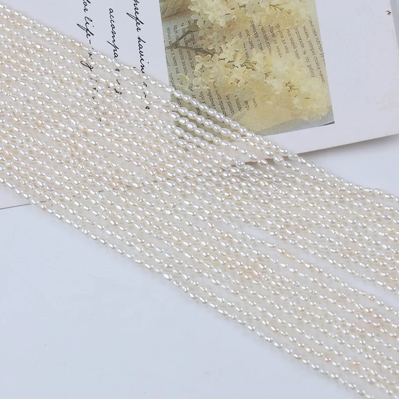 

2-2.5mm white color rice shape pearl in strand loose wholesale freshwater pearls beads