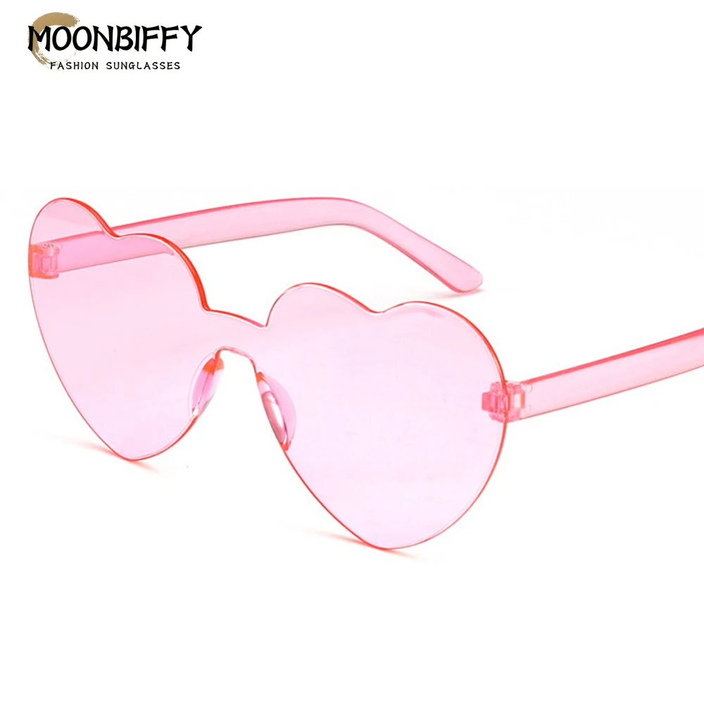 

Недорогие модные солнцезащитные очки без оправы в форме сердца, женские роскошные брендовые дизайнерские солнцезащитные очки, милые привл...