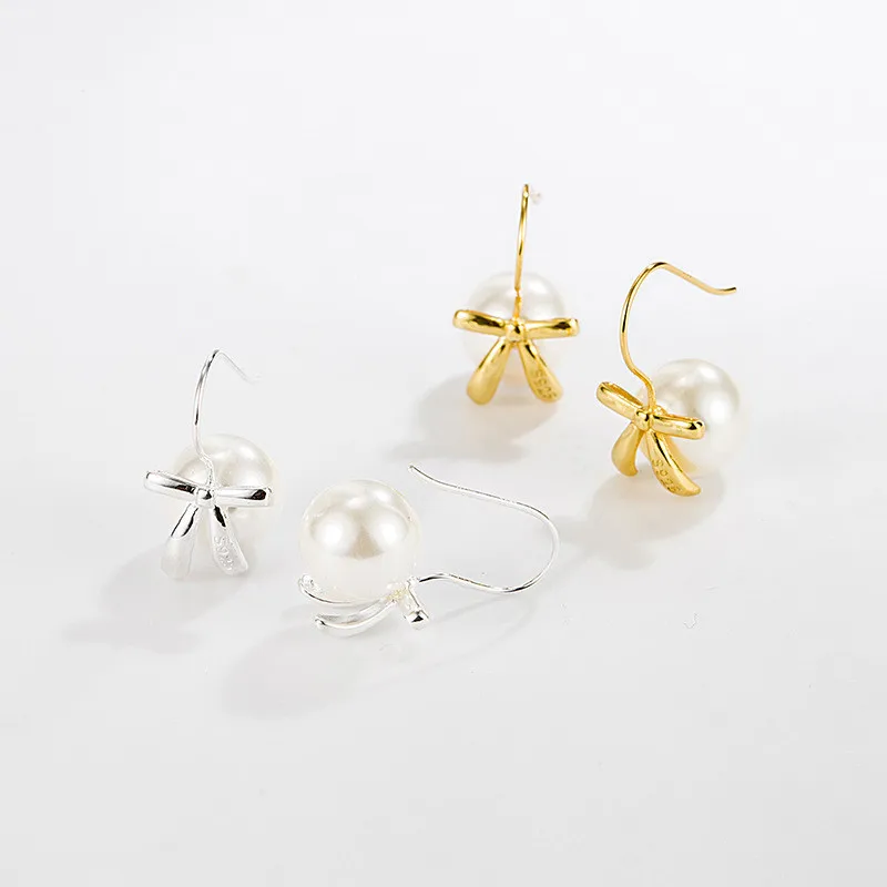 Серьги-подвески из серебра 925 пробы с жемчугом и бантом