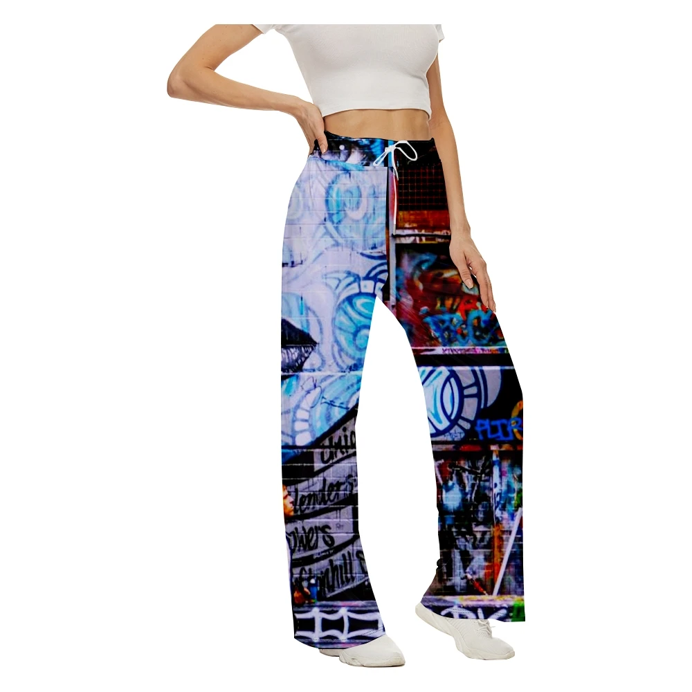 

Женские брюки с широкими штанинами и принтом граффити